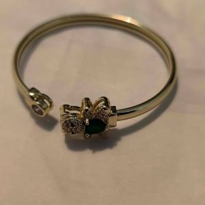 Bracelet doré rigide réglable avec ours perlé
