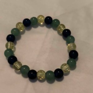 Bracelet en perles de couleur vert noir transparent